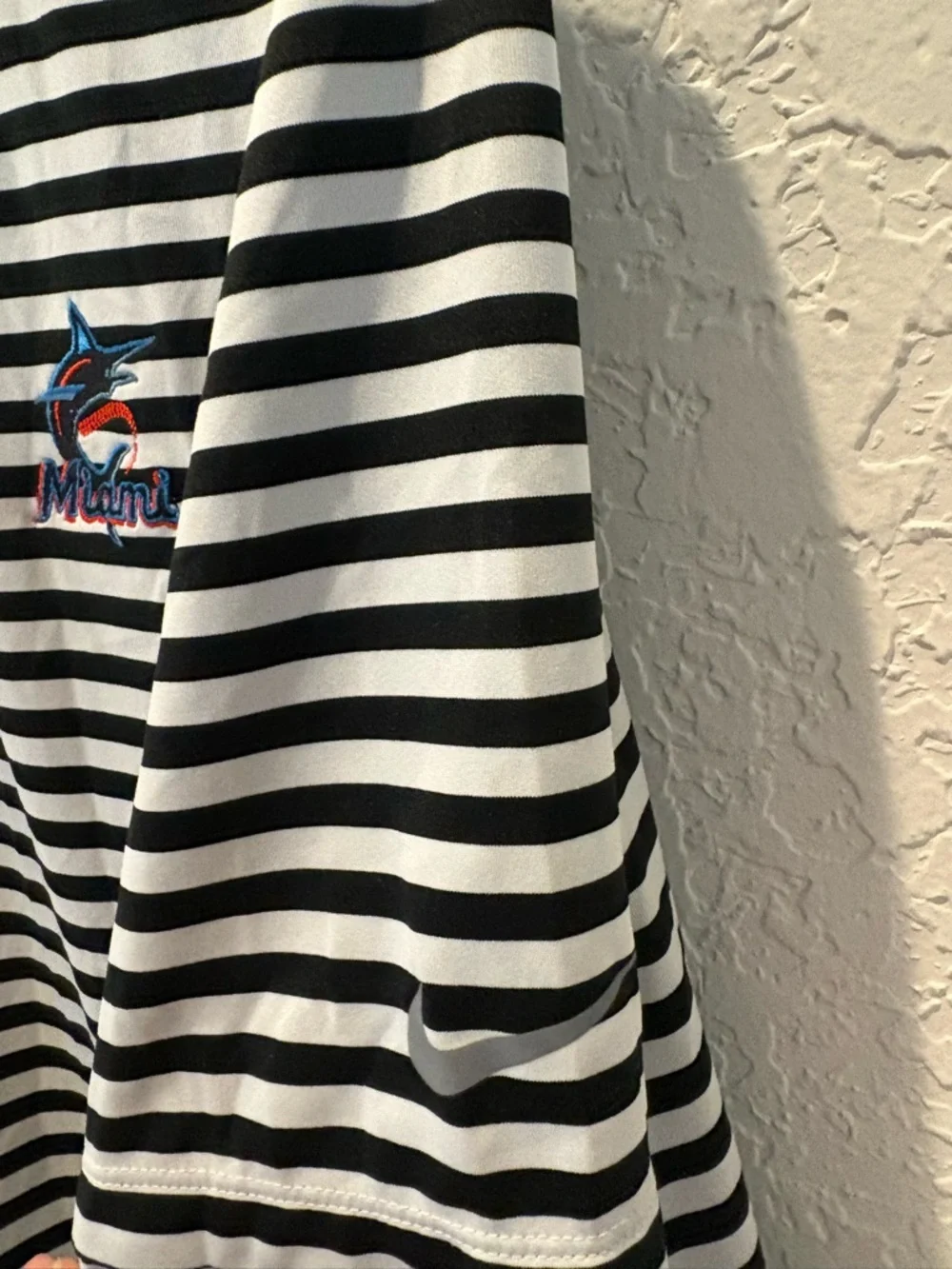 Nike Black & White Striped Polo with Embroidered Miami Marlins Logo